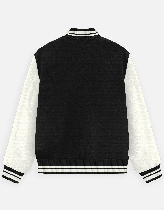 Black and white varsity jacket on a light gray background