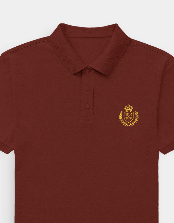 Maroon polo shirt with a gold emblem on a white background
Ravlen Polo
