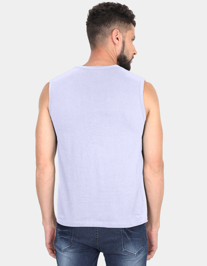 Man wearing a light purple sleeveless shirt on a white background
Clyne Tee