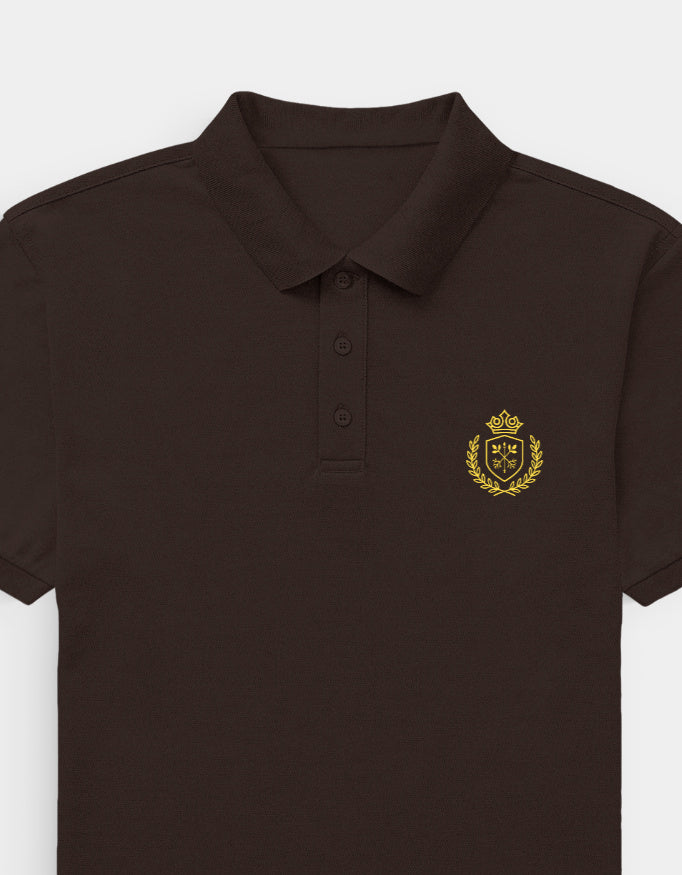 Brown polo shirt with a gold emblem on a white background
Coffee Brown Ravlen Polo
