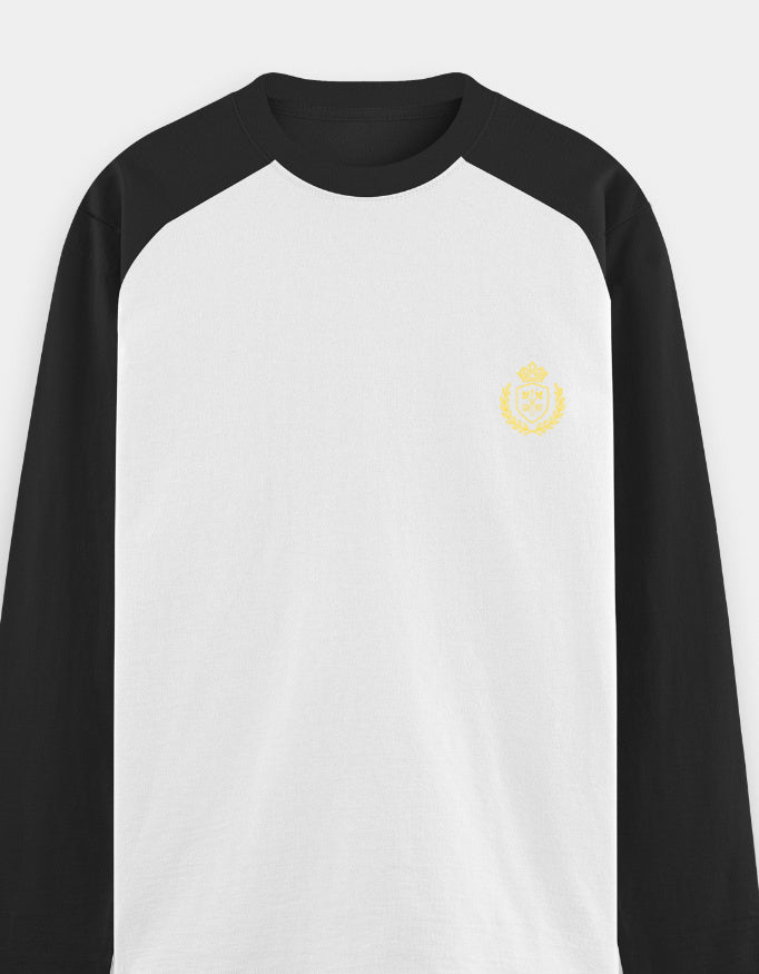 Black and white long-sleeve shirt with a yellow logo on a light gray background