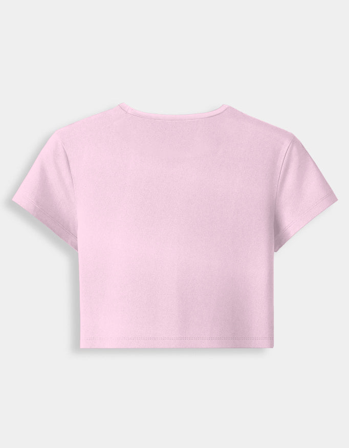 Pink crop top on a light gray background
Premium stretch cotton fabric of CozyVora baby tee – soft-touch cropped t-shirt for women in neutral tones