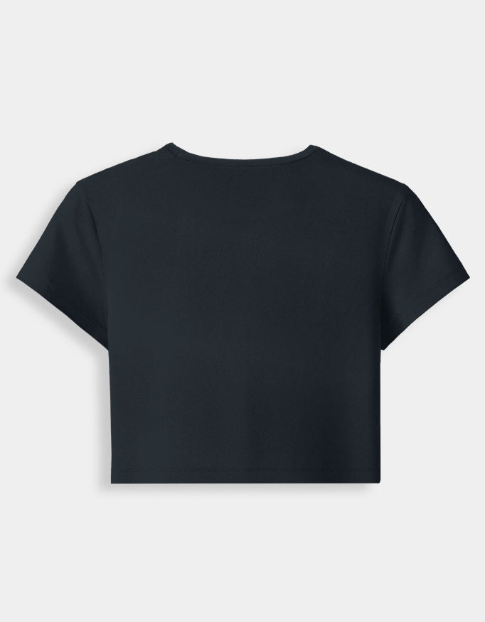 Navy Blue crop top on a light gray background
Premium stretch cotton fabric of CozyVora baby tee – soft-touch cropped t-shirt for women in neutral tones