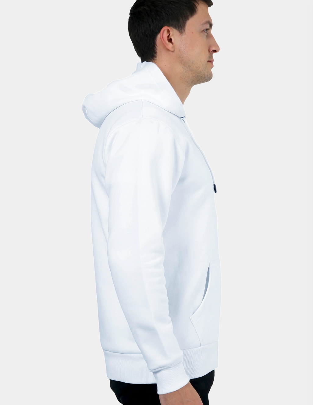 Person wearing a white hoodie with a brand logo on a light gray background