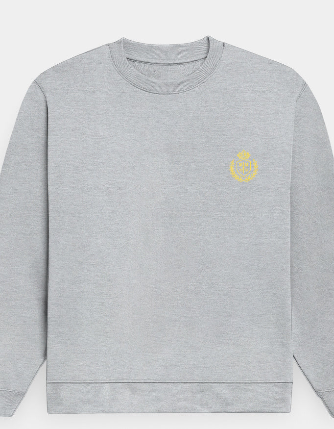 Gray sweatshirt with a yellow emblem on a white background
The Crestweight Sweatshirt Grey Melange