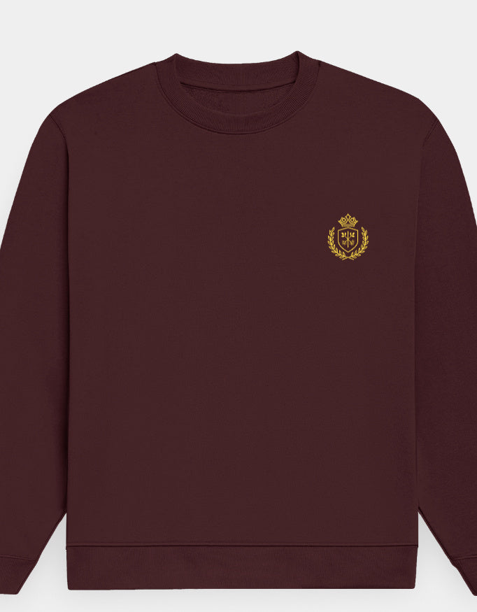 Maroon sweatshirt with a gold emblem on a white background
The Crestweight Sweatshirt Maroon
