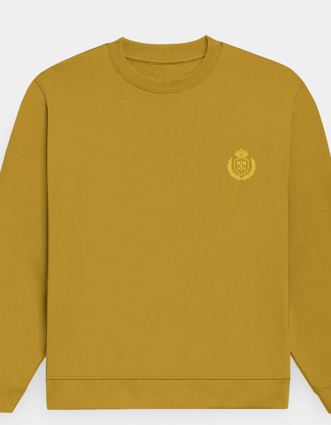 Mustard yellow sweatshirt with a small emblem on a white background
The Crestweight Sweatshirt Mustard Yellow